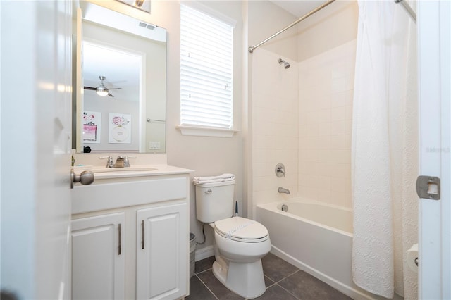 1505 Nassau Point Trl, Kissimmee, FL 34747 - bathroom featuring tile patterned floors, toilet, shower / bath combo, vanity, and a ceiling fan