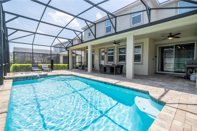 1505 Nassau Point Trl, Kissimmee, FL 34747 - view of pool featuring a patio, a ceiling fan, a pool with connected hot tub, and a grill