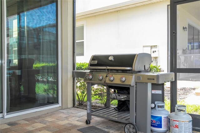 1505 Nassau Point Trl, Kissimmee, FL 34747 - view of patio / terrace featuring area for grilling