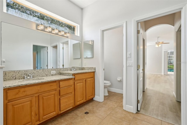 604 Cheviot Ct, Apopka, FL 32712 - bathroom with double vanity, toilet, tile patterned floors, and healthy amount of natural light