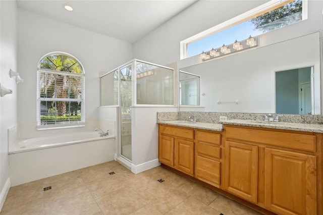604 Cheviot Ct, Apopka, FL 32712 - full bath with plenty of natural light, double vanity, and a garden tub