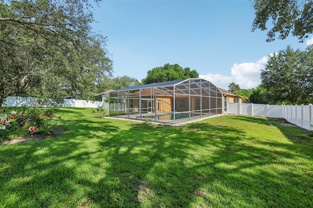 604 Cheviot Ct, Apopka, FL 32712 - view of yard with glass enclosure and a patio