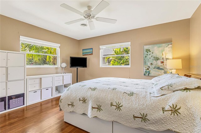 676 Dunblane Dr, Winter Park, FL 32792 - bedroom featuring wood finished floors and ceiling fan