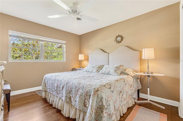 676 Dunblane Dr, Winter Park, FL 32792 - bedroom featuring baseboards, wood finished floors, and ceiling fan