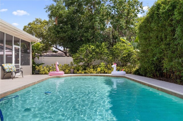676 Dunblane Dr, Winter Park, FL 32792 - view of swimming pool featuring a sunroom