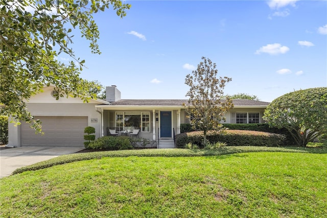 676 Dunblane Dr, Winter Park, FL 32792 - ranch-style house featuring a garage, a front yard, covered porch, driveway, and a chimney