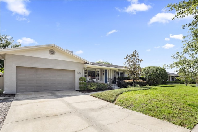 676 Dunblane Dr, Winter Park, FL 32792 - ranch-style home featuring a front yard, an attached garage, concrete driveway, a porch, and brick siding