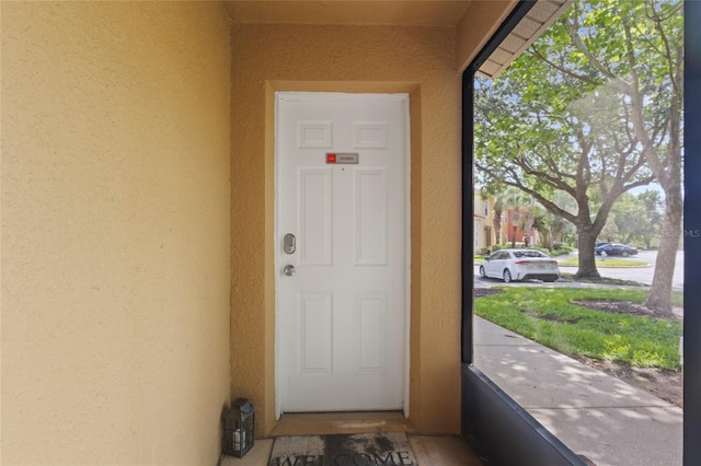 8507 Crystal Cove Loop, Kissimmee, FL 34747 - view of exterior entry with stucco siding