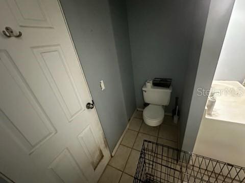 1511 Hobson St, Longwood, FL 32750 - bathroom with tile patterned flooring and toilet