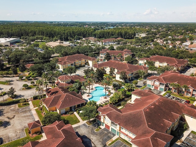 12106 Poppy Field Ln Unit 107, Orlando, FL 32837 - aerial perspective of suburban area with a pool