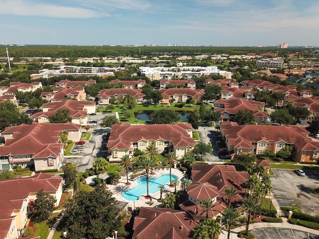 12106 Poppy Field Ln Unit 107, Orlando, FL 32837 - aerial perspective of suburban area with a pool