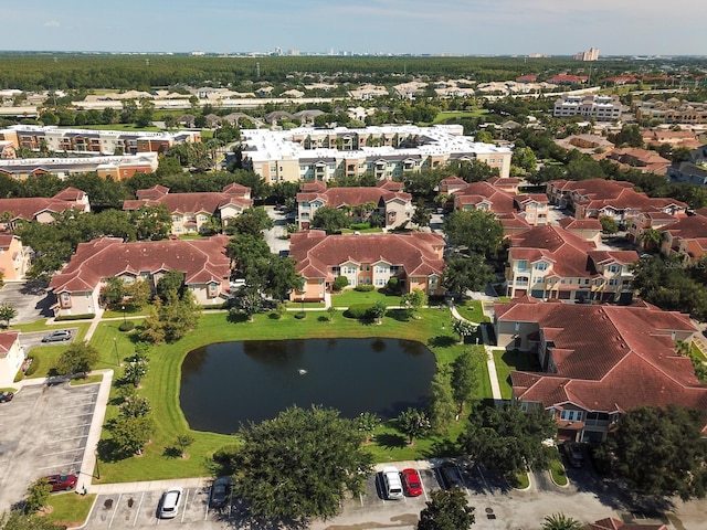 12106 Poppy Field Ln Unit 107, Orlando, FL 32837 - aerial perspective of suburban area with a large body of water