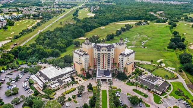 7650 Whisper Way Unit 104, Reunion, FL 34747 - bird's eye view of a golf course