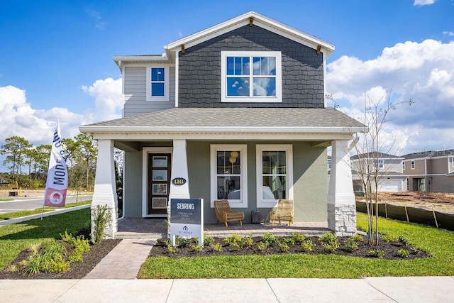 1341 Lumpini St, Saint Cloud, FL 34771 - view of front of property with covered porch and roof with shingles