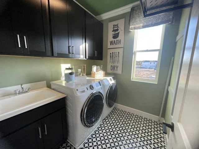 1341 Lumpini St, Saint Cloud, FL 34771 - laundry area with cabinet space, independent washer and dryer, ornamental molding, and baseboards