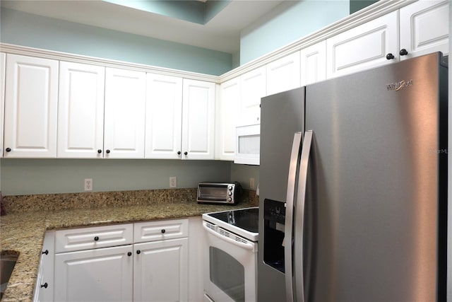 1320 NW 3rd Ave Unit 238, Gainesville, FL 32603 - kitchen with white appliances, white cabinetry, and stone countertops