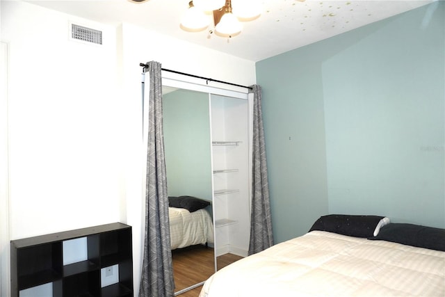 1320 NW 3rd Ave Unit 238, Gainesville, FL 32603 - bedroom featuring wood finished floors