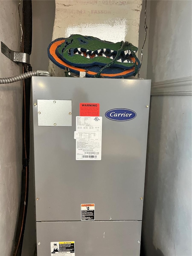 1320 NW 3rd Ave Unit 238, Gainesville, FL 32603 - utility room with heating unit