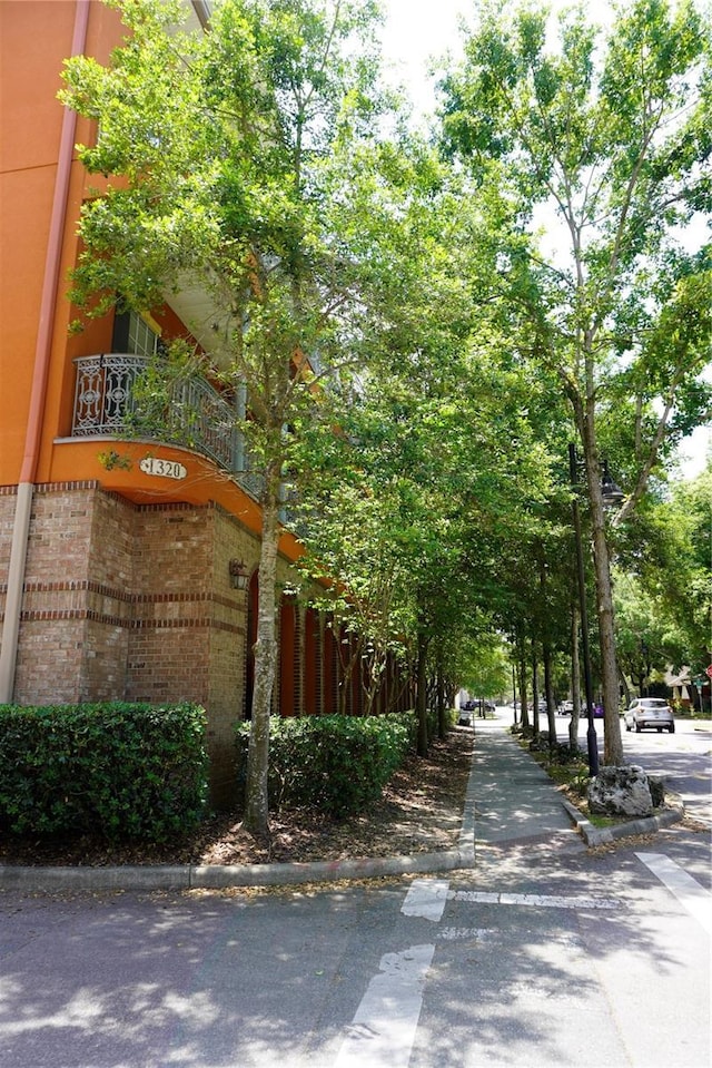 1320 NW 3rd Ave Unit 238, Gainesville, FL 32603 - view of asphalt street featuring curbs and sidewalks