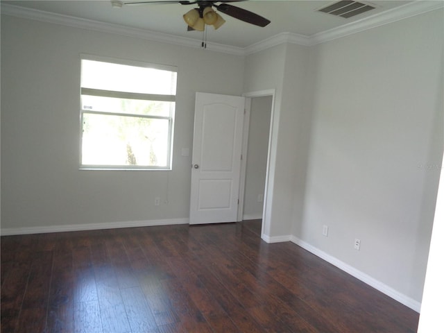 2451 Strandhill St, Orlando, FL 32824 - spare room with ceiling fan, dark wood-type flooring, crown molding, and baseboards