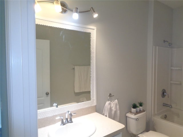2451 Strandhill St, Orlando, FL 32824 - full bathroom featuring toilet, vanity, and shower / bathtub combination