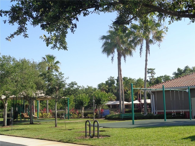2451 Strandhill St, Orlando, FL 32824 - view of home's community featuring a yard