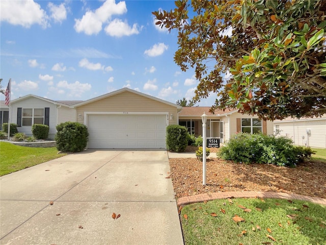 9514 SE 168th Maplesong Ln, The Villages, FL 32162 - ranch-style home featuring a garage and concrete driveway