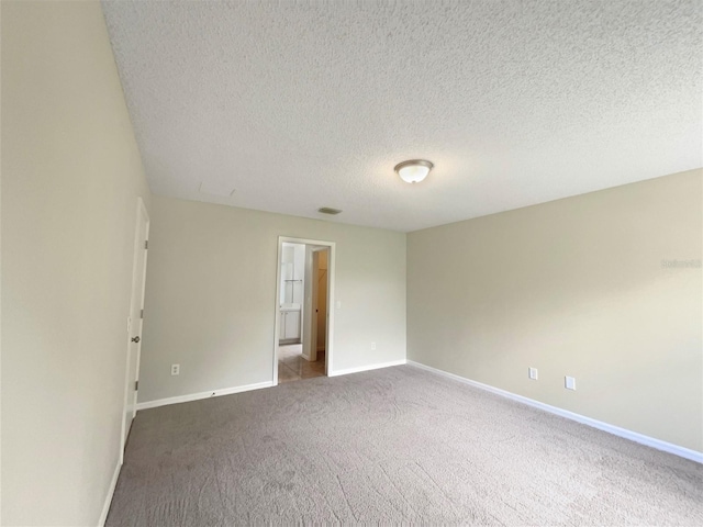 9514 SE 168th Maplesong Ln, The Villages, FL 32162 - carpeted spare room with baseboards and a textured ceiling