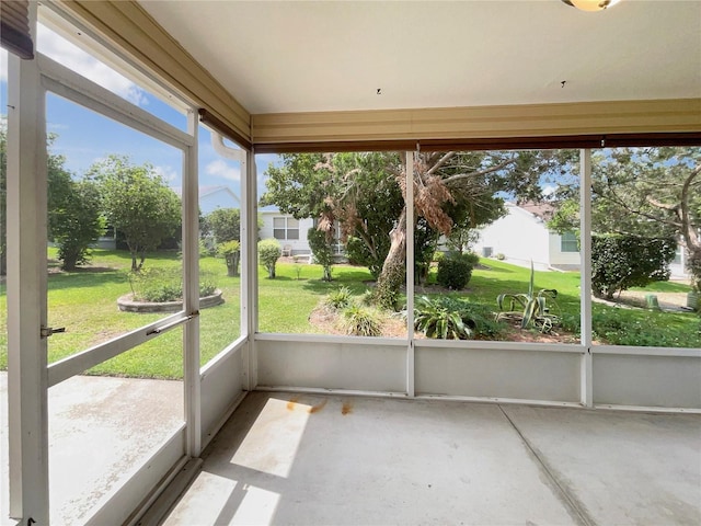 9514 SE 168th Maplesong Ln, The Villages, FL 32162 - unfurnished sunroom with healthy amount of natural light