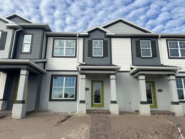 1356 Lumpini St, Saint Cloud, FL 34771 - view of front of house with stucco siding