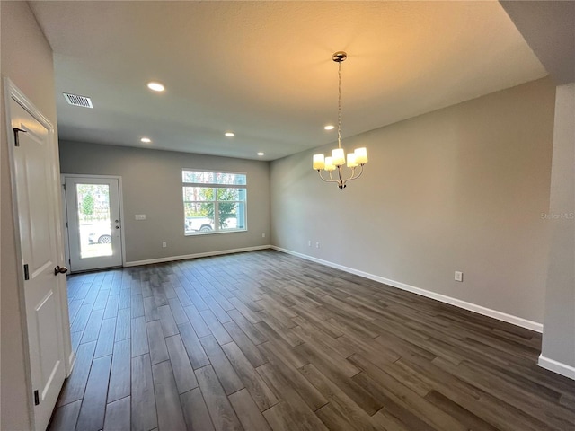 1356 Lumpini St, Saint Cloud, FL 34771 - spare room featuring dark wood finished floors, a chandelier, and recessed lighting
