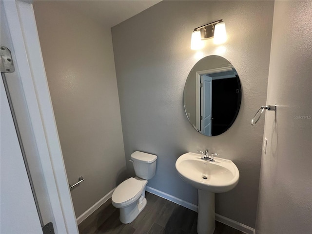 1356 Lumpini St, Saint Cloud, FL 34771 - half bath with wood finished floors and toilet