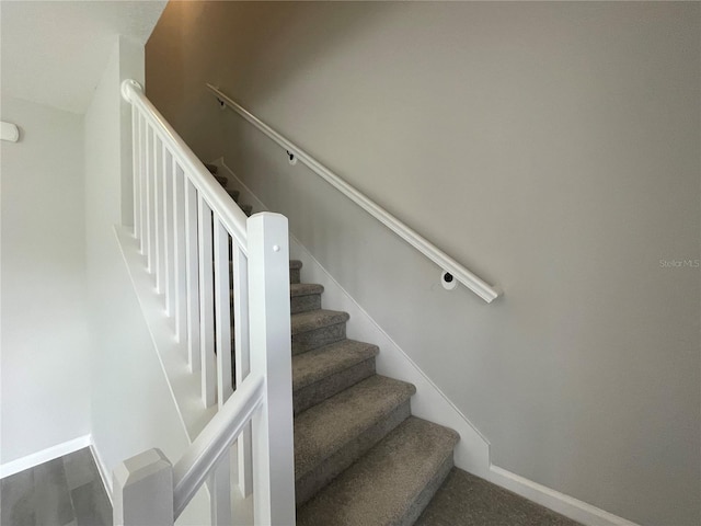 1356 Lumpini St, Saint Cloud, FL 34771 - staircase with carpet and baseboards