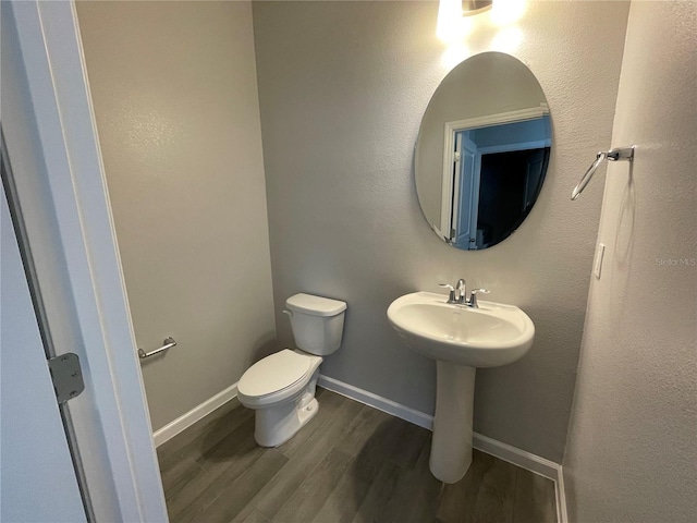 1356 Lumpini St, Saint Cloud, FL 34771 - half bathroom with wood finished floors and toilet