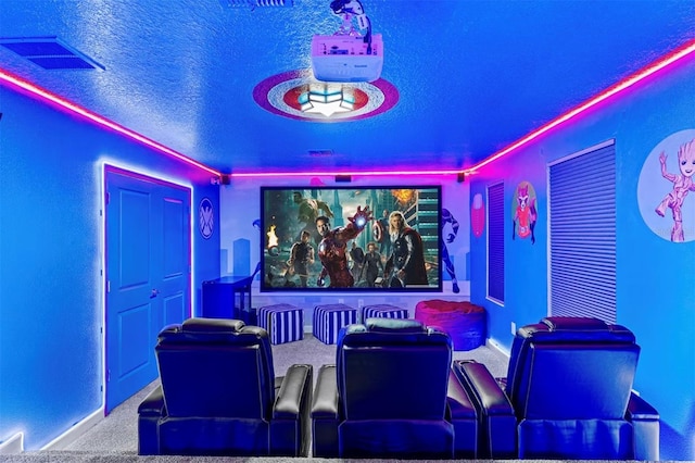 4161 Paragraph Dr, Kissimmee, FL 34746 - carpeted cinema featuring a textured ceiling and baseboards