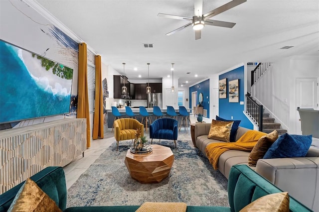 4161 Paragraph Dr, Kissimmee, FL 34746 - living room featuring stairway, ceiling fan, light marble finish floors, and recessed lighting