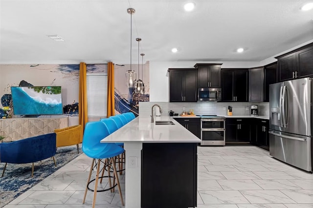 4161 Paragraph Dr, Kissimmee, FL 34746 - kitchen with appliances with stainless steel finishes, light marble finish floors, a sink, a peninsula, and recessed lighting