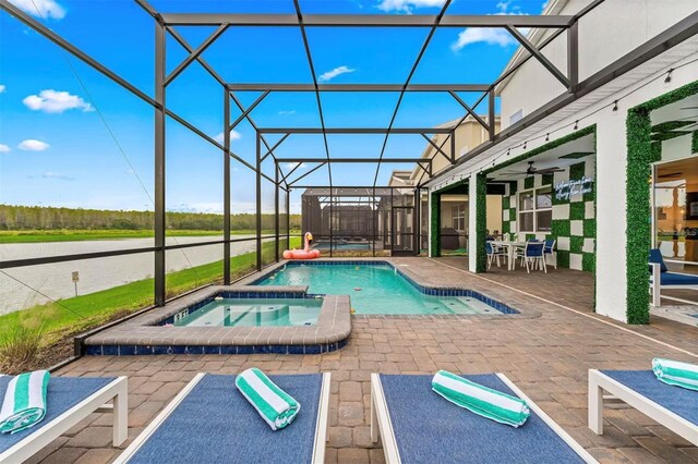 4161 Paragraph Dr, Kissimmee, FL 34746 - view of pool with a patio area, a ceiling fan, a lanai, and a pool with connected hot tub