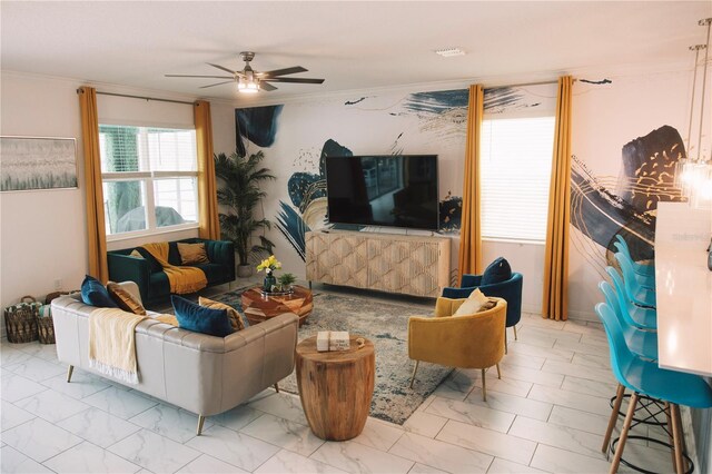 4161 Paragraph Dr, Kissimmee, FL 34746 - living area featuring marble look tile flooring, ceiling fan, and ornamental molding