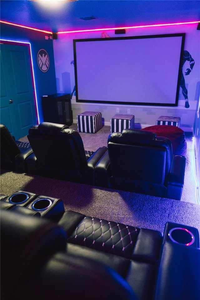 4161 Paragraph Dr, Kissimmee, FL 34746 - cinema room featuring carpet
