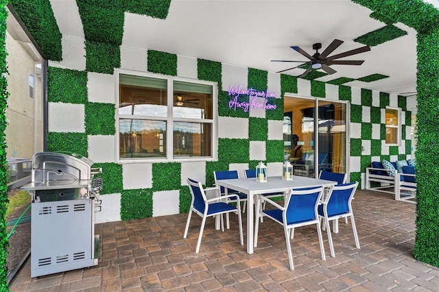 4161 Paragraph Dr, Kissimmee, FL 34746 - view of patio / terrace with ceiling fan, outdoor dining area, and grilling area