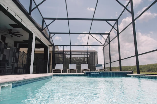 4161 Paragraph Dr, Kissimmee, FL 34746 - swimming pool featuring a lanai, ceiling fan, and a patio