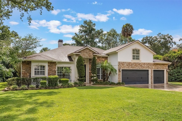 1874 Royal Majesty Ct, Oviedo, FL 32765 - view of front of property featuring stone siding, stucco siding, and a front yard