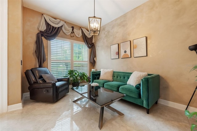 1874 Royal Majesty Ct, Oviedo, FL 32765 - living room featuring a chandelier and baseboards