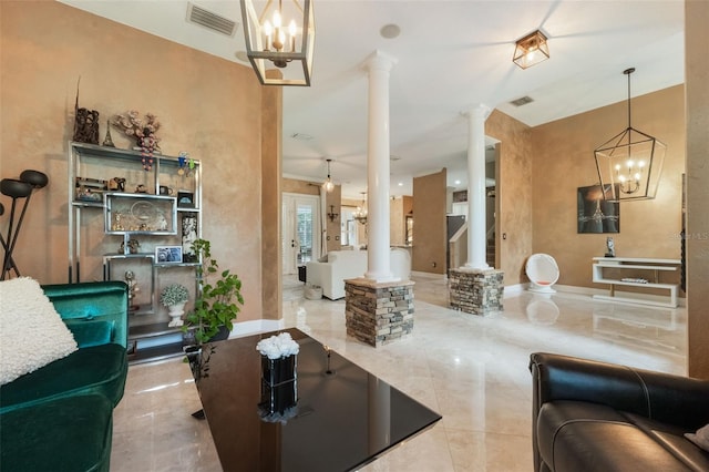 1874 Royal Majesty Ct, Oviedo, FL 32765 - living area featuring decorative columns, a chandelier, and baseboards