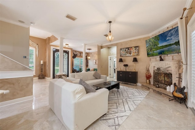 1874 Royal Majesty Ct, Oviedo, FL 32765 - living room featuring light marble finish flooring, crown molding, ornate columns, a fireplace with raised hearth, and baseboards