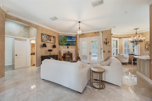 1874 Royal Majesty Ct, Oviedo, FL 32765 - living area with light marble finish flooring, ornamental molding, and a chandelier