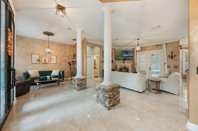 1874 Royal Majesty Ct, Oviedo, FL 32765 - living room featuring ornate columns, ornamental molding, and french doors