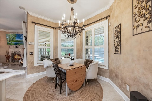 1874 Royal Majesty Ct, Oviedo, FL 32765 - dining area featuring a chandelier, baseboards, ornamental molding, and a fireplace