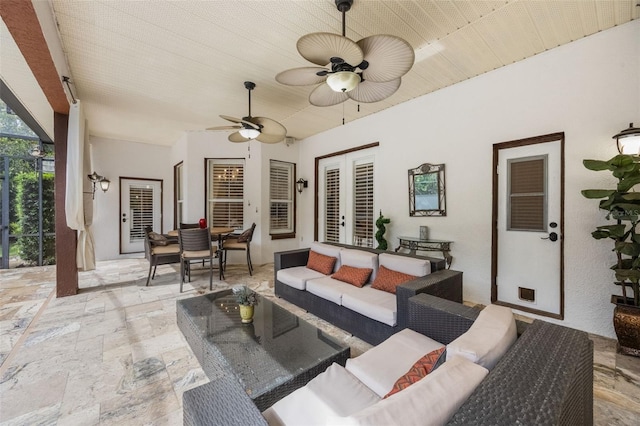 1874 Royal Majesty Ct, Oviedo, FL 32765 - living area featuring stone tile floors, ceiling fan, and french doors